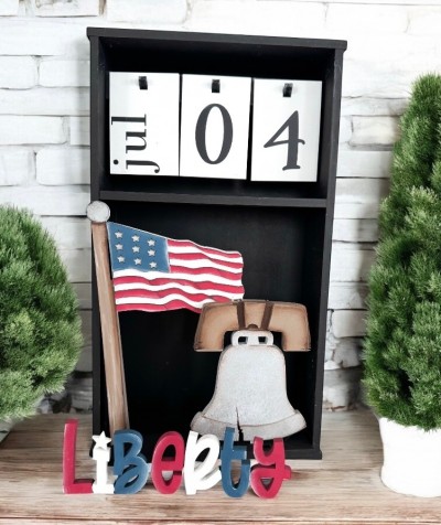 Unfinished kit measures apx 8" tall and includes wooden MDF: *1 - “LIBERTY” word *1 - Flag pole with overlays *1 - Liberty Bell with overlays *1 - Base